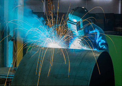 person welding metal